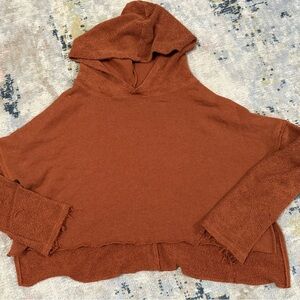 Out from under sweatshirt